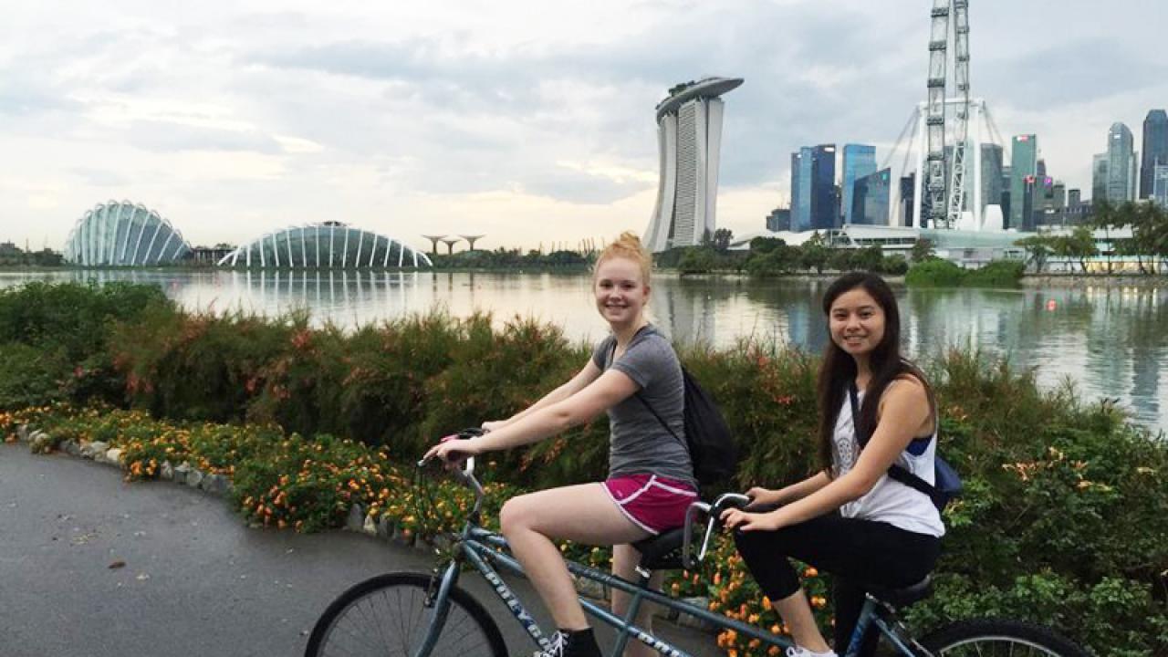 My friend, Rosely, and I biking around Singapore Blog Post, Header Image